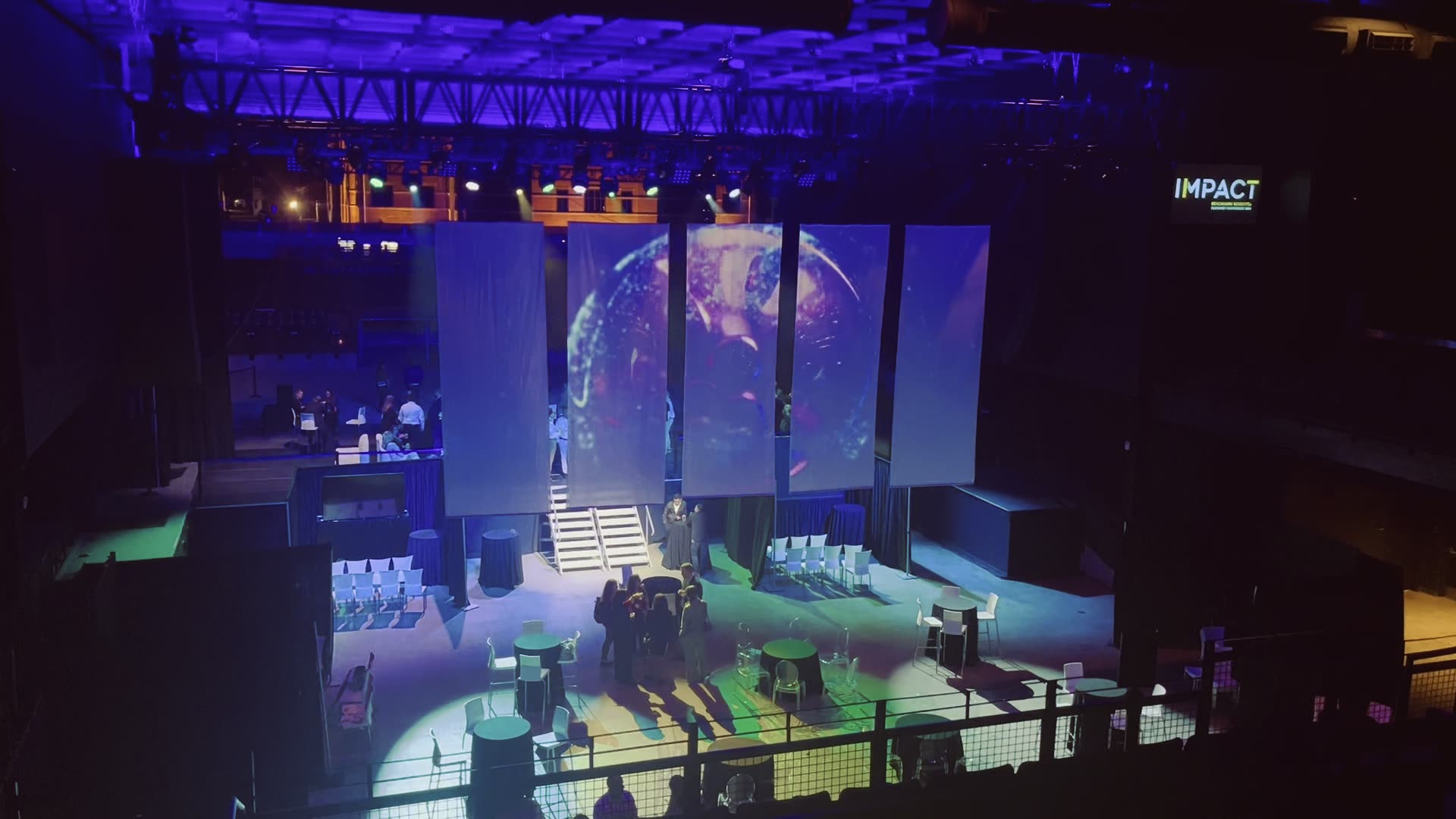 Benchmark Gensuite: A double-sided projection installation on suspended fabric panels for the Benchmark Gensuite event, produced for Ovation.